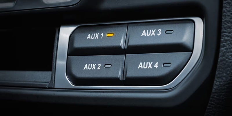 2026 Jeep Wrangler auxiliary switch control panel interior detail