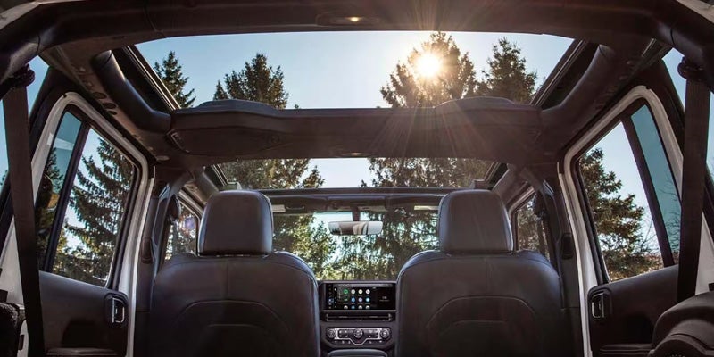 2026 Jeep Wrangler interior with removable roof panels open