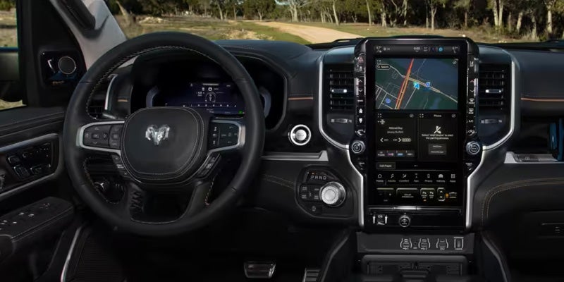 2026 Ram 1500 interior dashboard with touchscreen navigation display