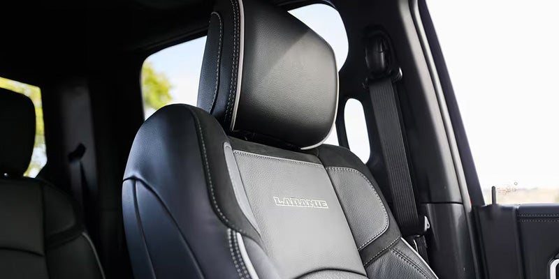 Ram 2500 interior leather seat with headrest and premium cabin details.