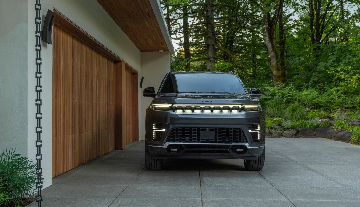 2026 Jeep Grand Wagoneer REEV parked in driveway.
